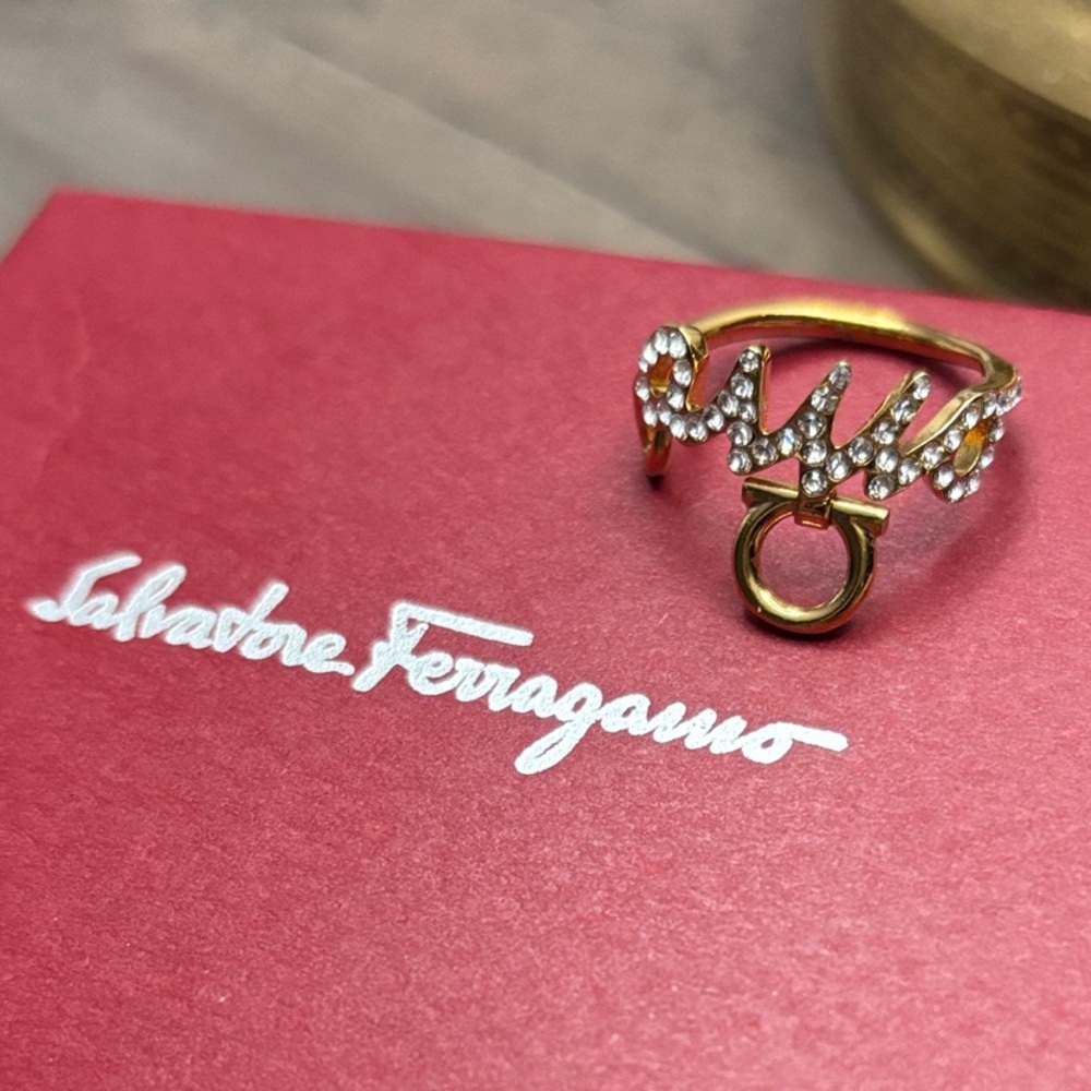 Salvatore Ferragamo Gold Ring with Silver Accents